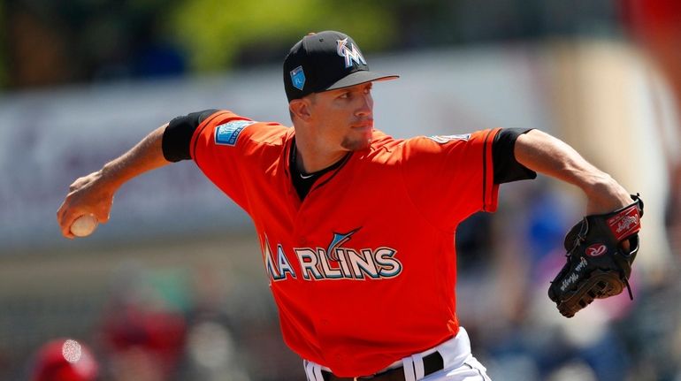 Chris Mazza (89) pitches during a spring training baseball game...