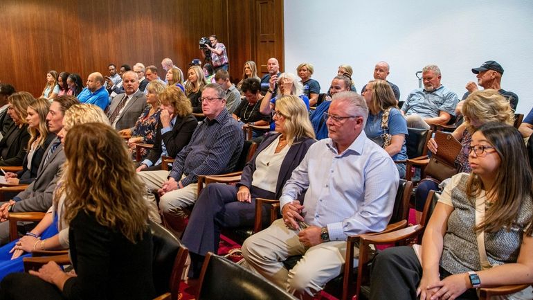 A crowd prepares for a Michigan Court of Appeals hearing...