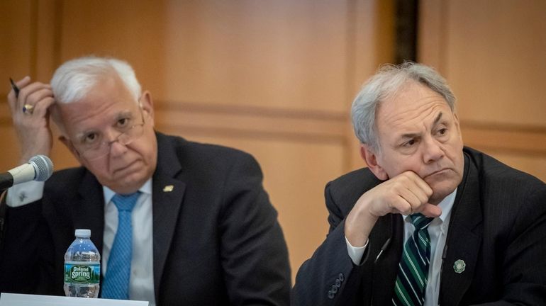 New members John Costanzo, left, and John Nader during the Long Island...