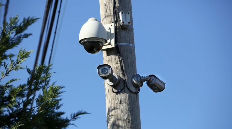 Surveillance cameras, like these at Depot Road and First Avenue...