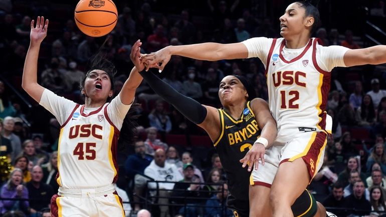 Southern California guard JuJu Watkins (12) and Southern California guard...