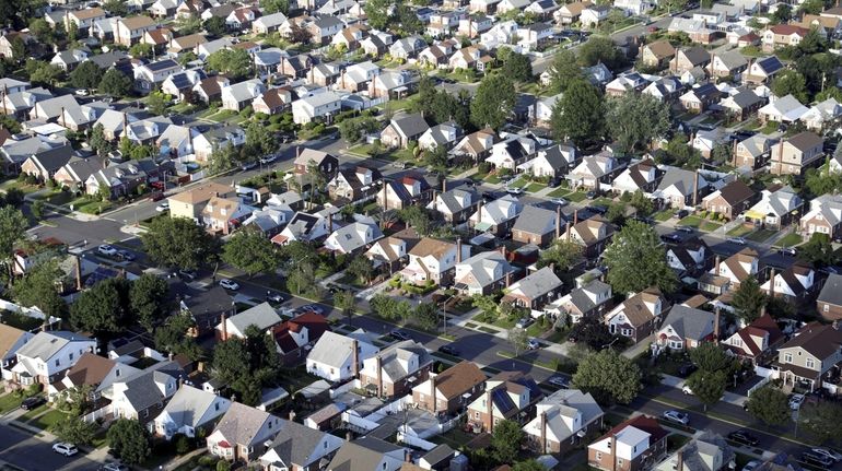 The online application is available in 11 languages. Above, an Elmont neighborhood.