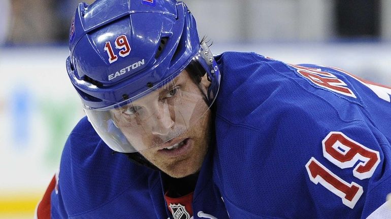 Rangers' Brad Richards looks on before a face-off against the...