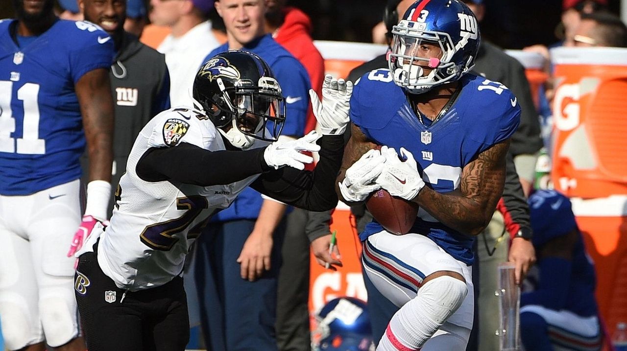 Beckham's career day, late 66-yard TD lead Giants past Ravens 27-23