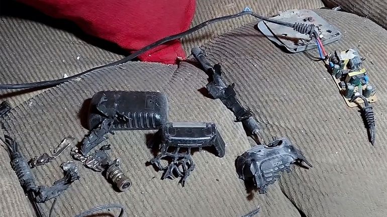 This video grab, shows a walkie-talkie that was exploded inside...