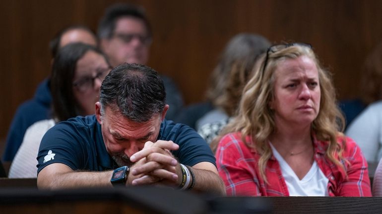 Buck Myre, left, and Sheri Myre parents of slain son...