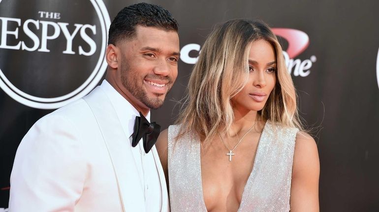 Liverpool gifts Russell Wilson and wife Ciara their own soccer