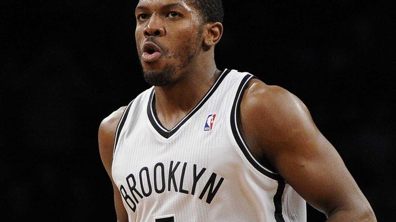 Joe Johnson reacts after sinking one of his 10 three-point...