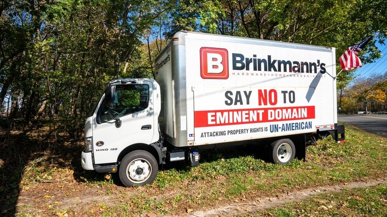 A truck with a message opposing Southold Town's attempt to...