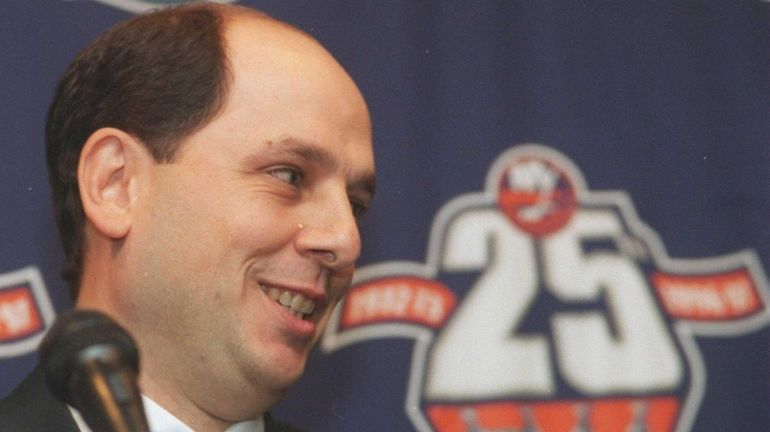 John Spano smiles at a news conference on Feb. 2,...