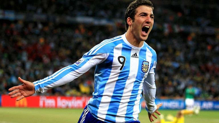 Gonzalo Higuain of Argentina celebrates scoring his side's second goal...