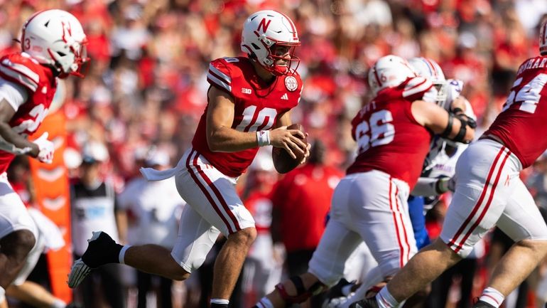 Nebraska quarterback Heinrich Haarberg (10) carries the ball against Louisiana...