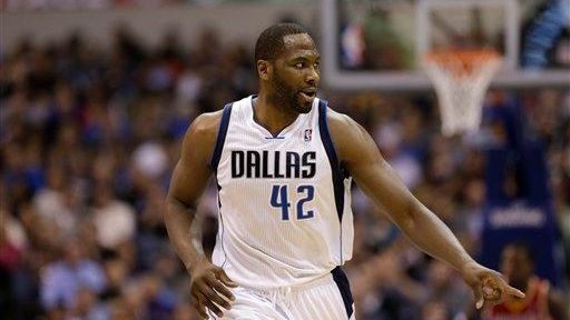 ??Dallas Mavericks forward Elton Brand reacts during a game against...