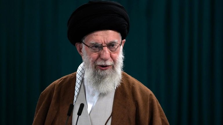 Iranian Supreme Leader Ayatollah Ali Khamenei speaks with media members...