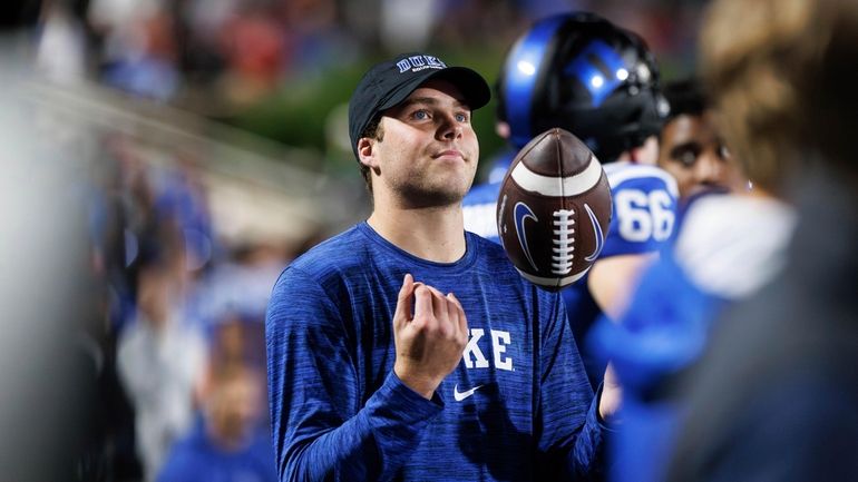 Duke quarterback Riley Leonard, who was injured in a game...