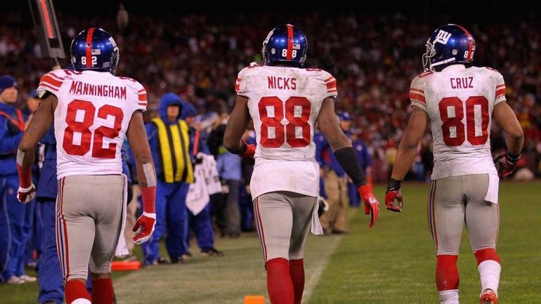 Mario Manningham, Hakeem Nicks and Victor Cruz of the New...