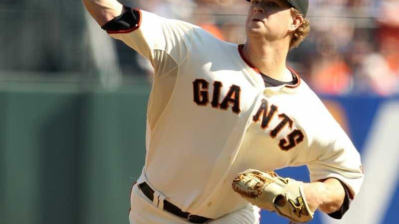 The Giants' Aaron Rowand hits a single in the fifth inning against