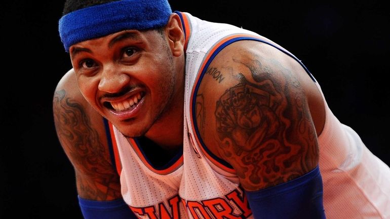 Carmelo Anthony of the Knicks looks on during the second...