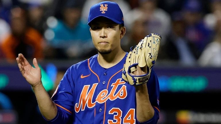 Kodai Senga  of the New York Mets reacts after his...