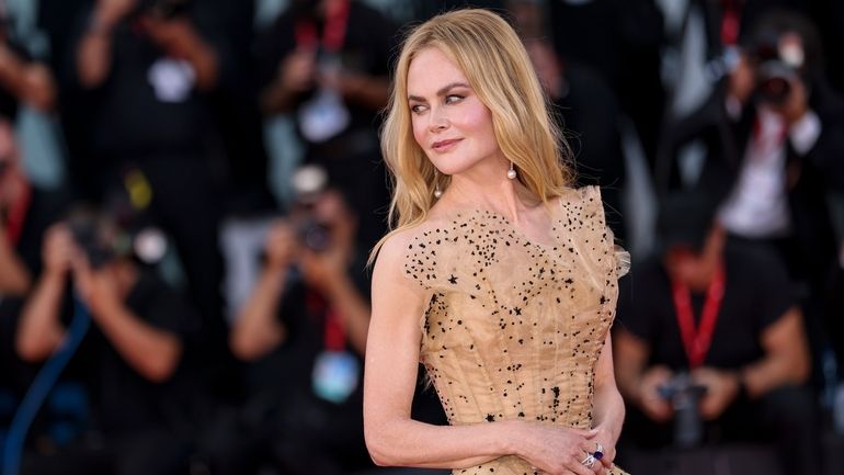 Nicole Kidman poses for photographers upon arrival for the premiere...