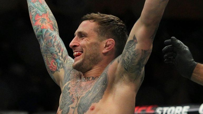 Gregor Gillespie celebrates his victory over Andrew Holbrook at UFC...