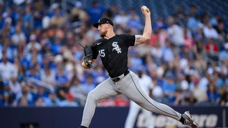 Chicago White Sox pitcher Garrett Crochet throws to a Toronto...