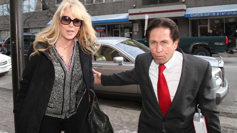 Dina Lohan and her lawyer outside First District Court in...