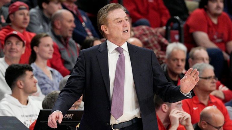 St. John's head coach Rick Pitino directs his players during...