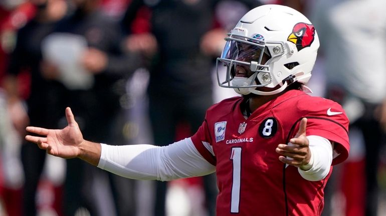 Cardinals quarterback Kyler Murray gestures during the first half of...