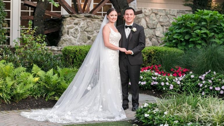 Danielle Wilcox and Andrew Delio on their wedding day.