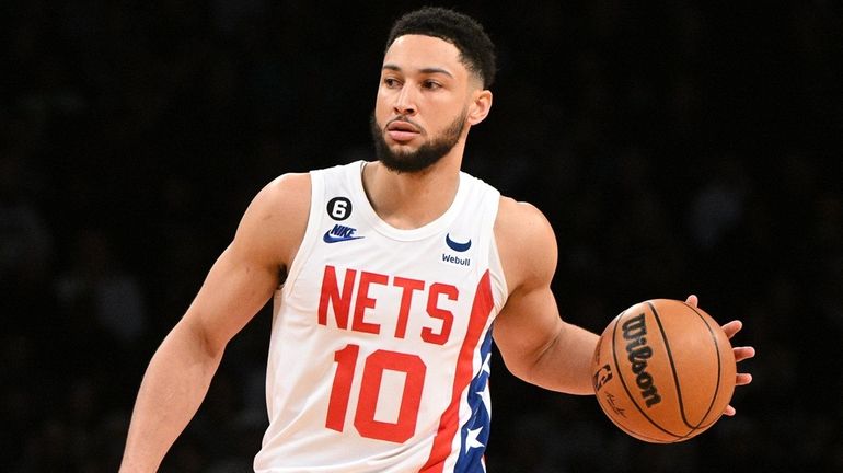 Brooklyn Nets guard Ben Simmons controls the ball against the...