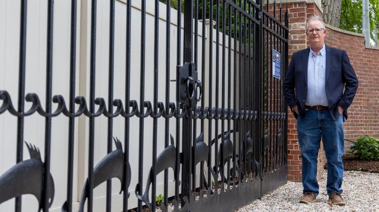 David Rapelje, the director of Bayville Museum, is pictured in front...