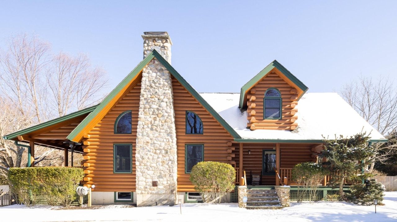 Log cabin on 2.5 acres in Southold on the North Fork asks 1.25 million