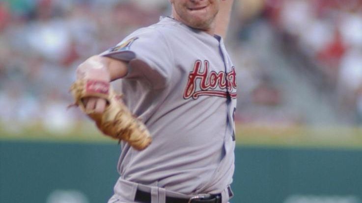 Houston Astros' pitcher Jeriome Robertson releases a pitch against the...