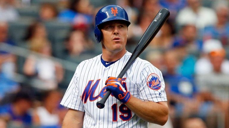 Jay Bruce #19 of the New York Mets strikes out...