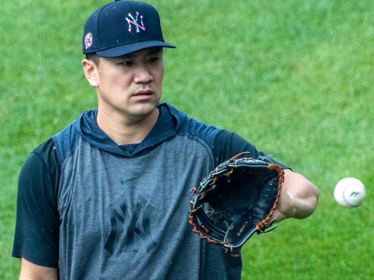 Yankees pitcher Masahiro Tanaka returns to Japan with his family