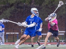 Twins Max and Harry Eynon thrive in rain for Port Washington boys lax