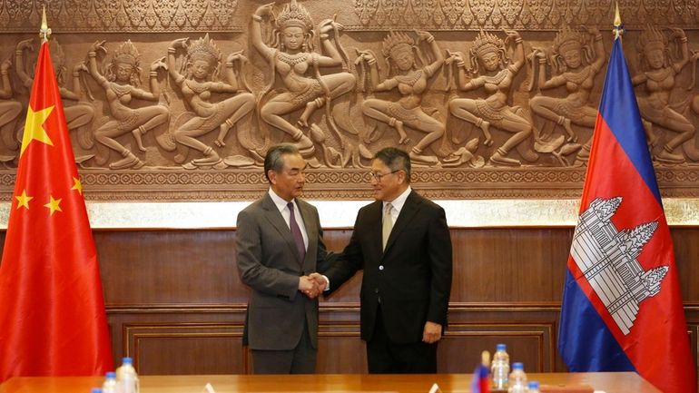 In this photo released by Agence Kampuchea Press (AKP), Chinese...