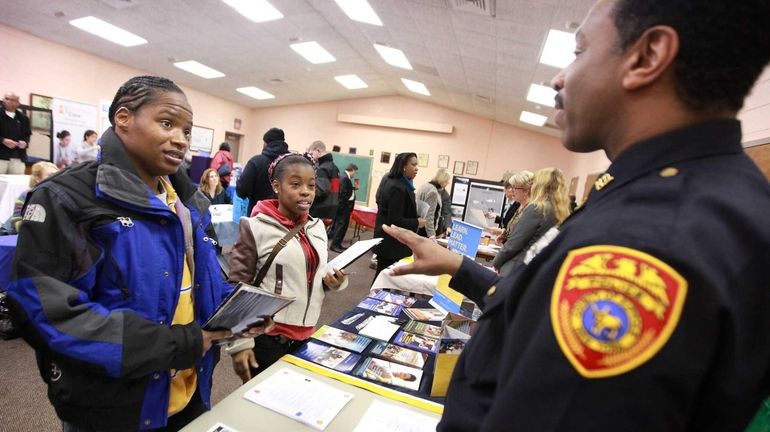 Inesha Pendergrass, 31, of Brentwood, left, and her friend Alexandria...