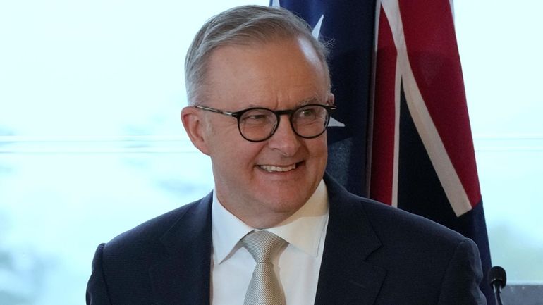 Australian Prime Minister Anthony Albanese smiles at the end of...