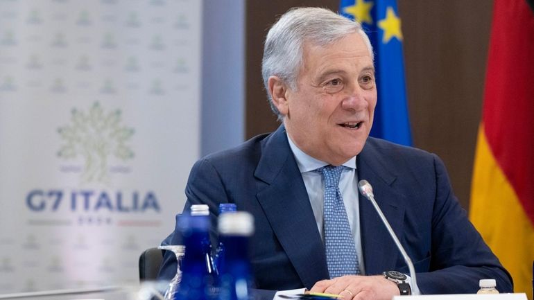 Italy's Foreign Minister Antonio Tajani speaks while meeting with members...