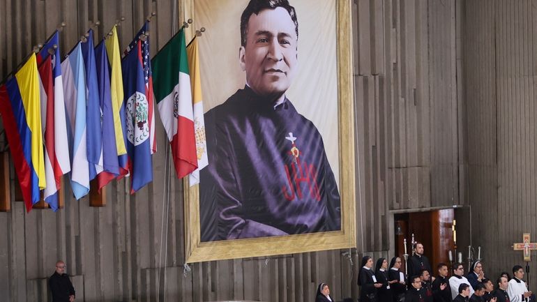 A portrait of Rev. Moisés Lira hangs at the Basilica...