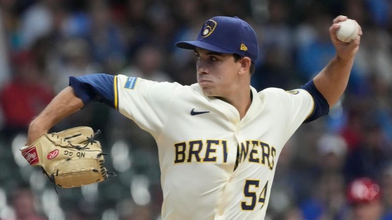 Milwaukee Brewers starter Robert Gasser throws during the first inning...