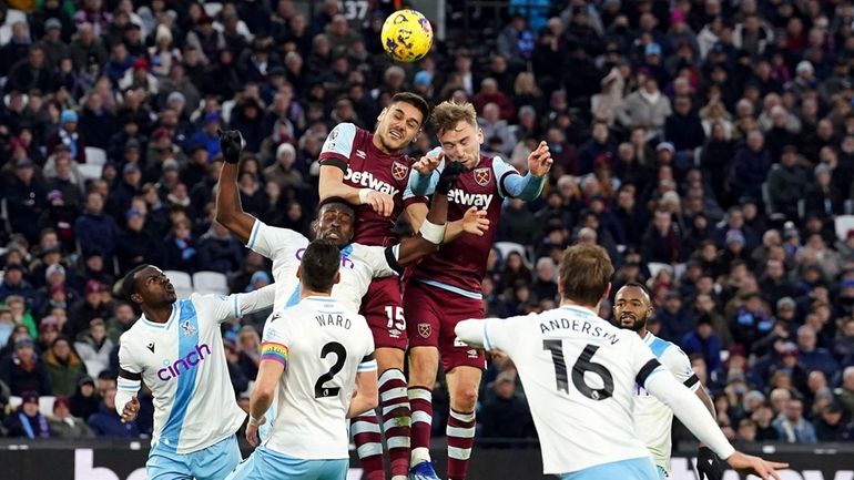 West Ham United's Konstantinos Mavropanos and West Ham United's Jarrod...