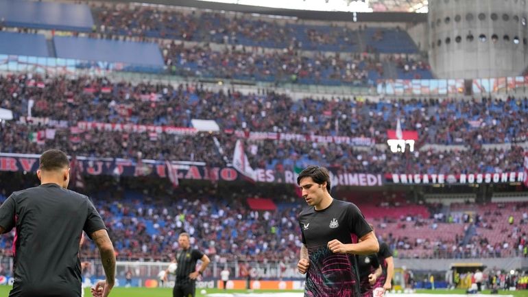 Newcastle's Sandro Tonali warms up prior to the start of...