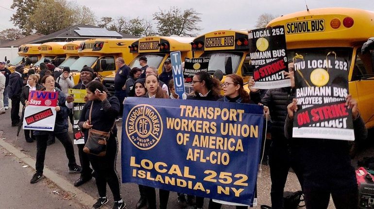 Striking members of TWU Local 252 rally in Oceanside on...