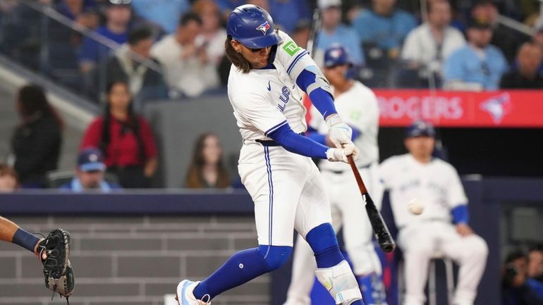 Toronto Blue Jays' Bo Bichette hits a two-run home run...