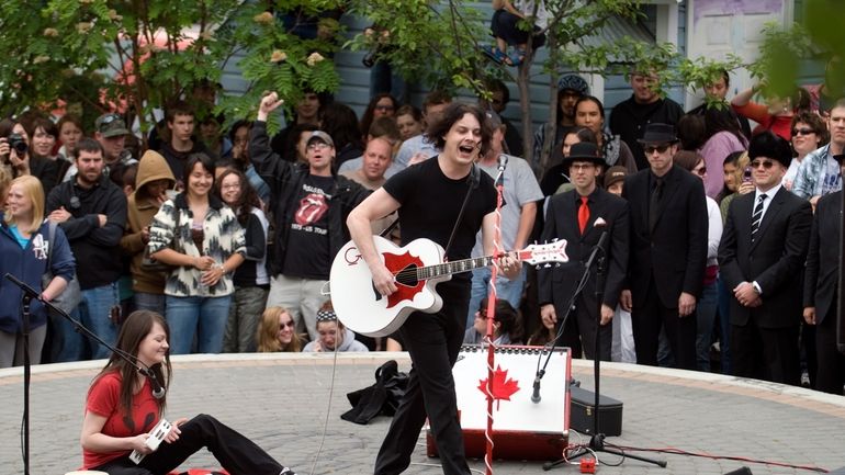 Musicians Jack White, right, and Meg White of the band...