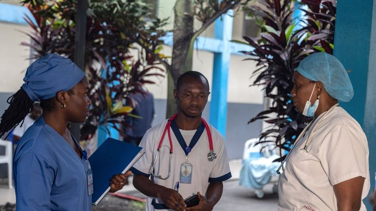 Medical staff talk to each other at the general hospital...