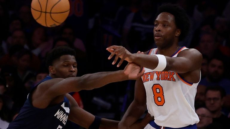 OG Anunoby of the Knicks dishes off a pass in the...